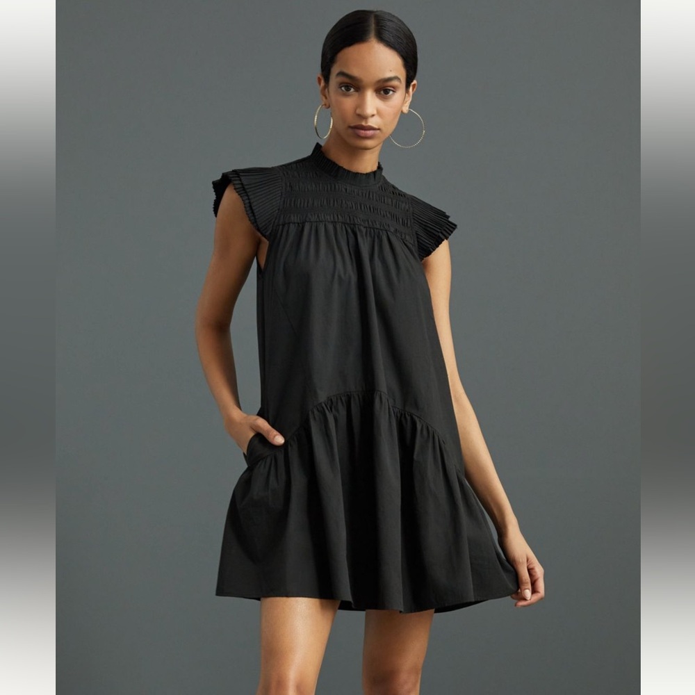 Anthropologie smocked ruffled‎ mini dress.